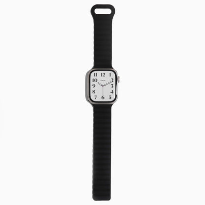 Magnetic Snap Silicone Apple Watch Band in black with watch attached, front view on white