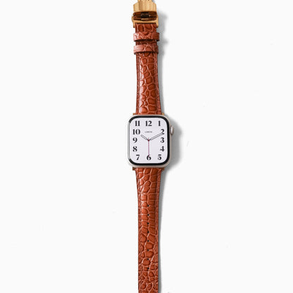 Alligator Apple Watch Band in brown alligator-embossed leather, front view on white