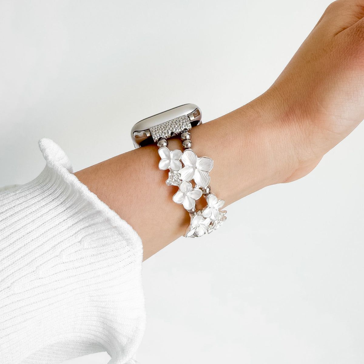 Bloom Apple Watch Bracelet in White worn on wrist