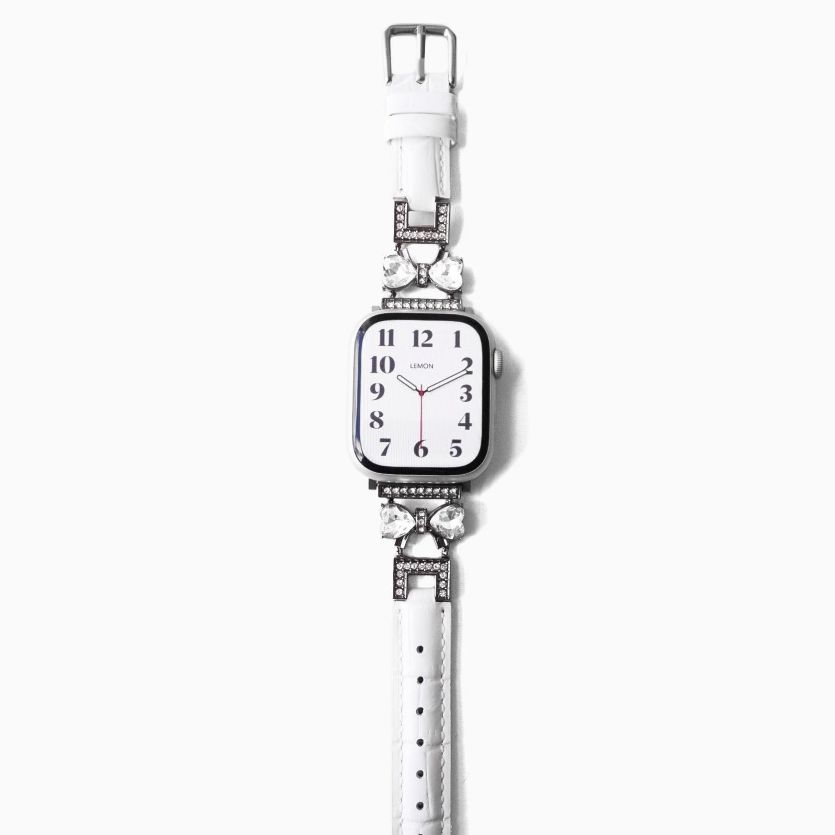 Silver APPLE watch with a white strap 