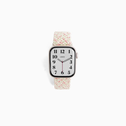 Cloud Nylon Apple Watch Band in spotted starlight, speckled braided band, watch face view on white