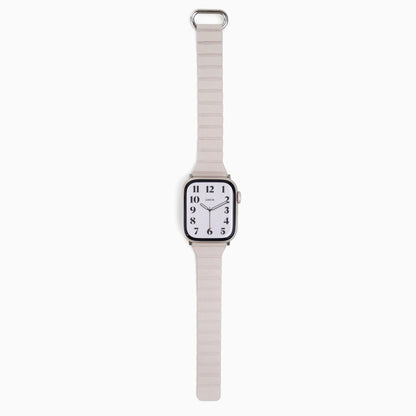 Slim Snap Loop Apple Watch Band in starlight with watch attached, front view on white
