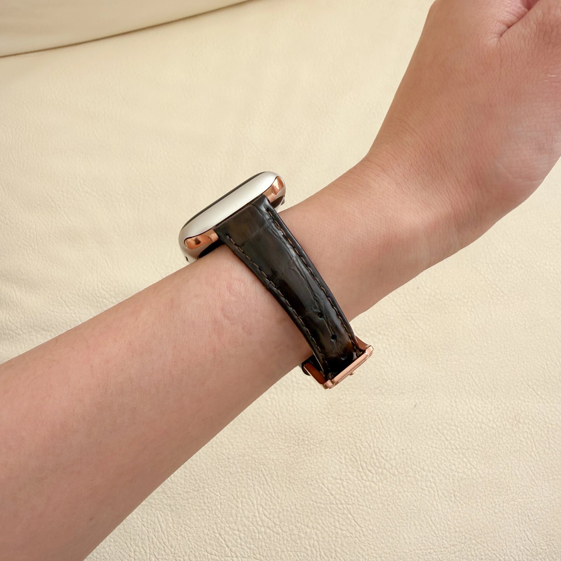 Smartwatch with a DARK BROWN band on a wrist 