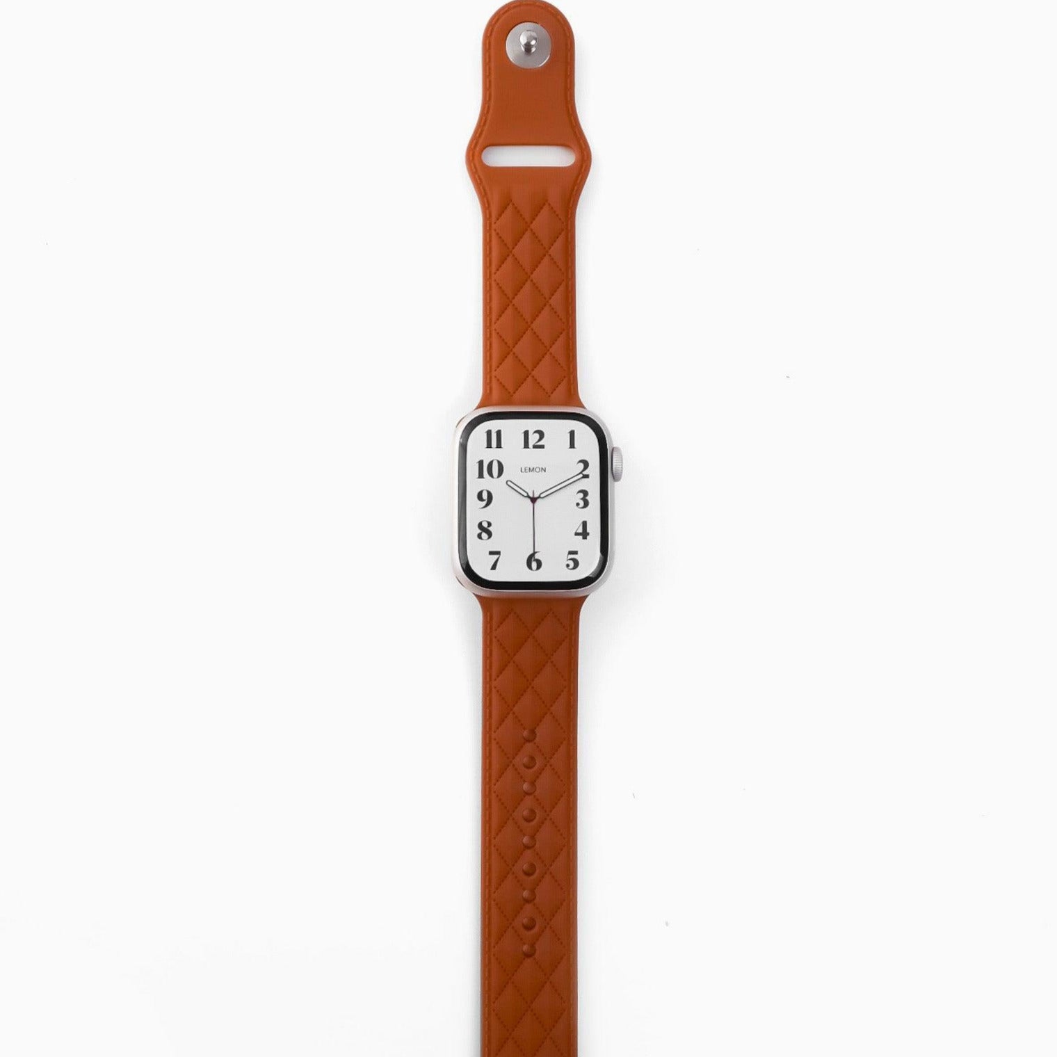 A brown lattice-patterned rubber band for Apple Watch, displayed on a white background.