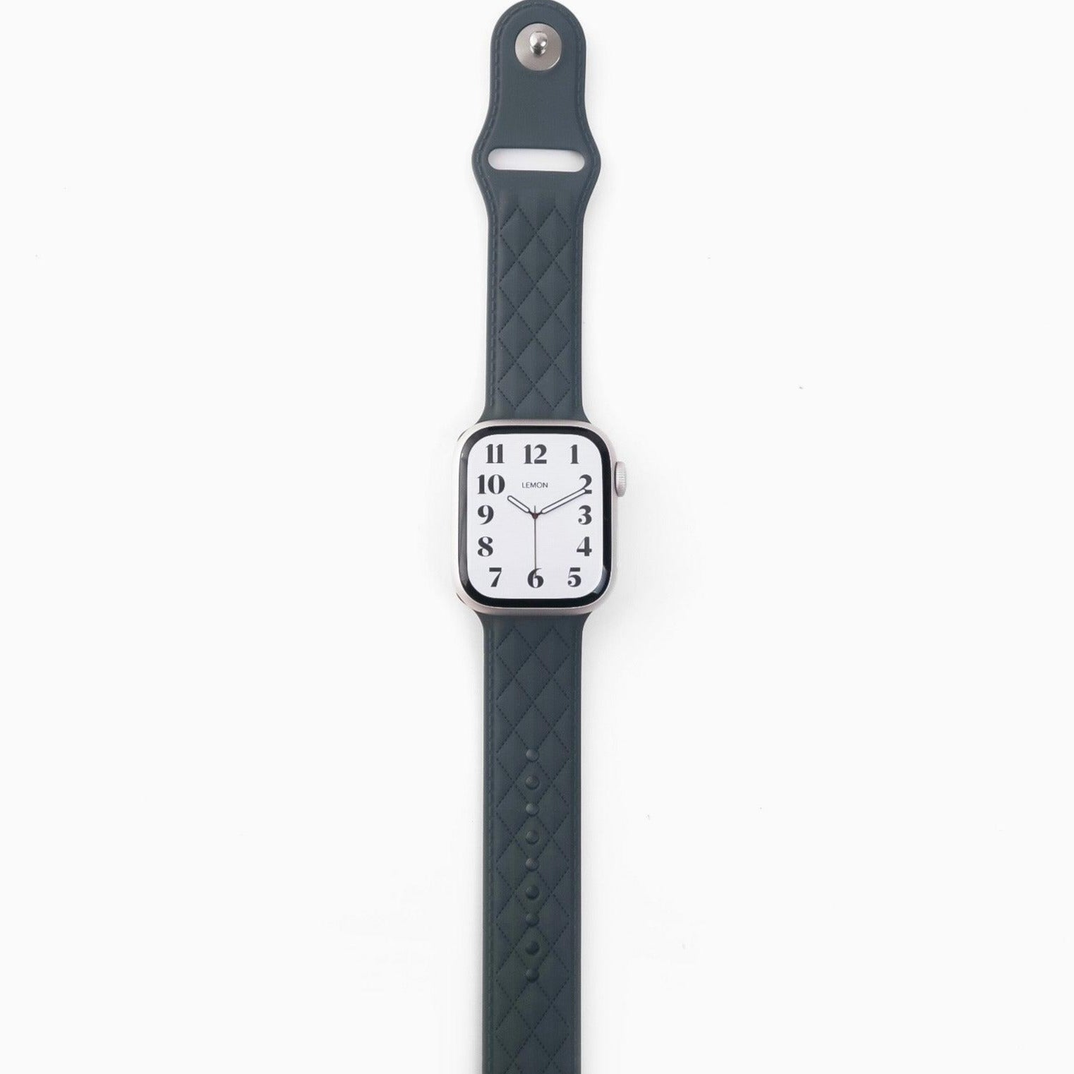 A gray lattice-patterned rubber band for Apple Watch, displayed on a white background.