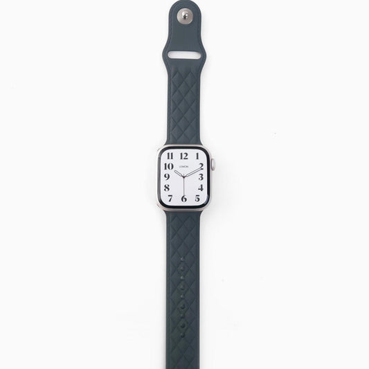 A gray lattice-patterned rubber band for Apple Watch, displayed on a white background.