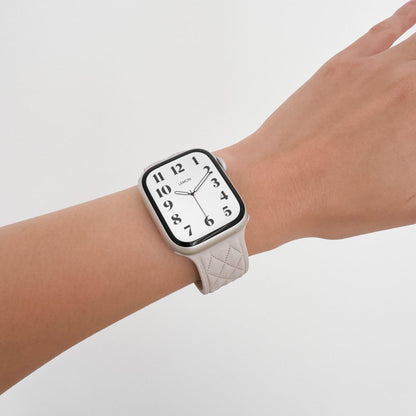 Lattice Silicone Apple Watch Band in Starlight worn on wrist, watch face view