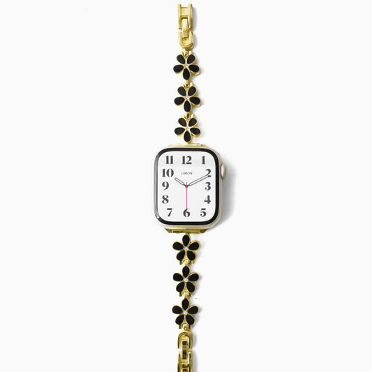gold APPLE watch bracelet with floral design 
