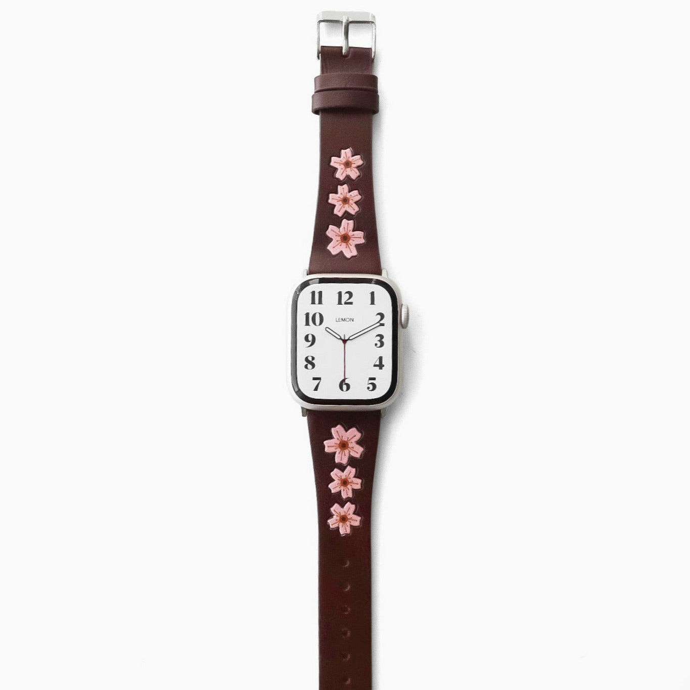 apple Watch with a brown strap featuring pink sakura