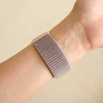 Soft Nylon Apple Watch Loop in dark pink worn on wrist, close view of woven nylon
