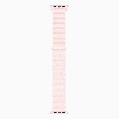 Soft Nylon Apple Watch Loop in light pink, full length woven strap on white