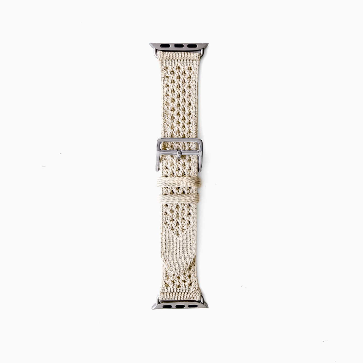 A beige woven mesh watch band with a silver metal buckle, shown vertically on a plain white background.