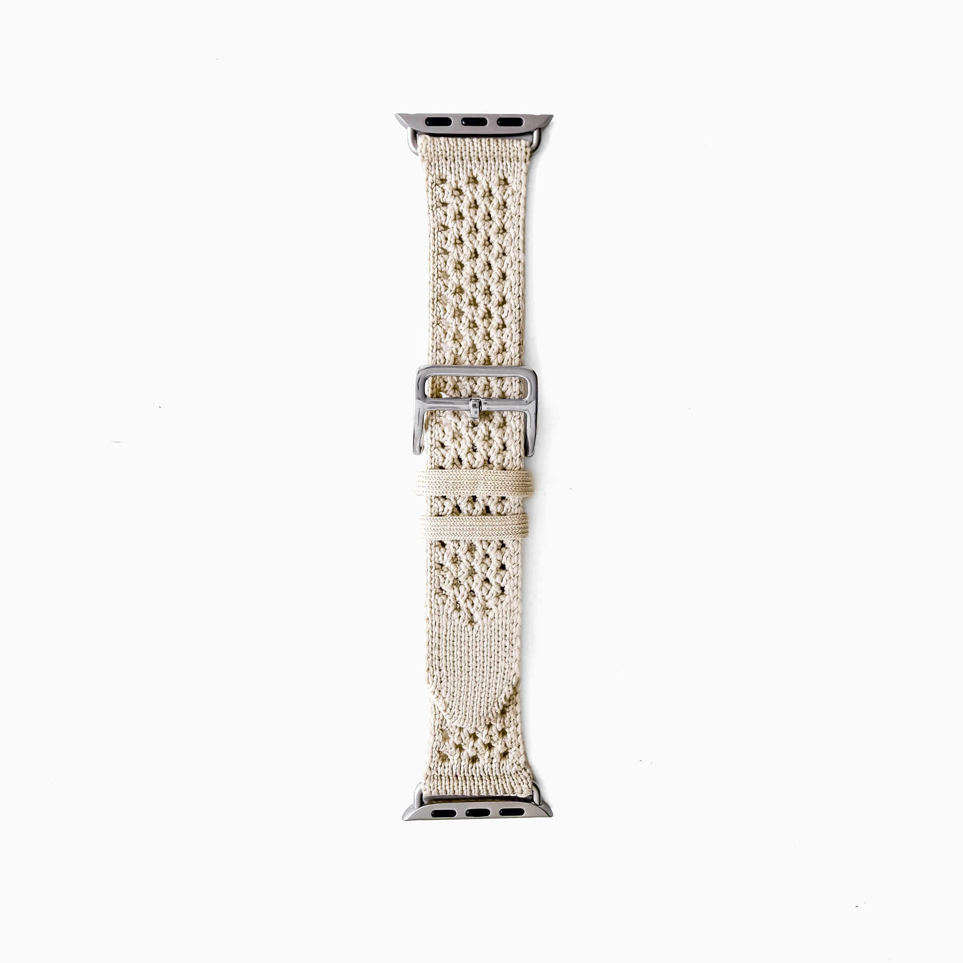 A beige woven mesh watch band with a silver metal buckle, shown vertically on a plain white background.