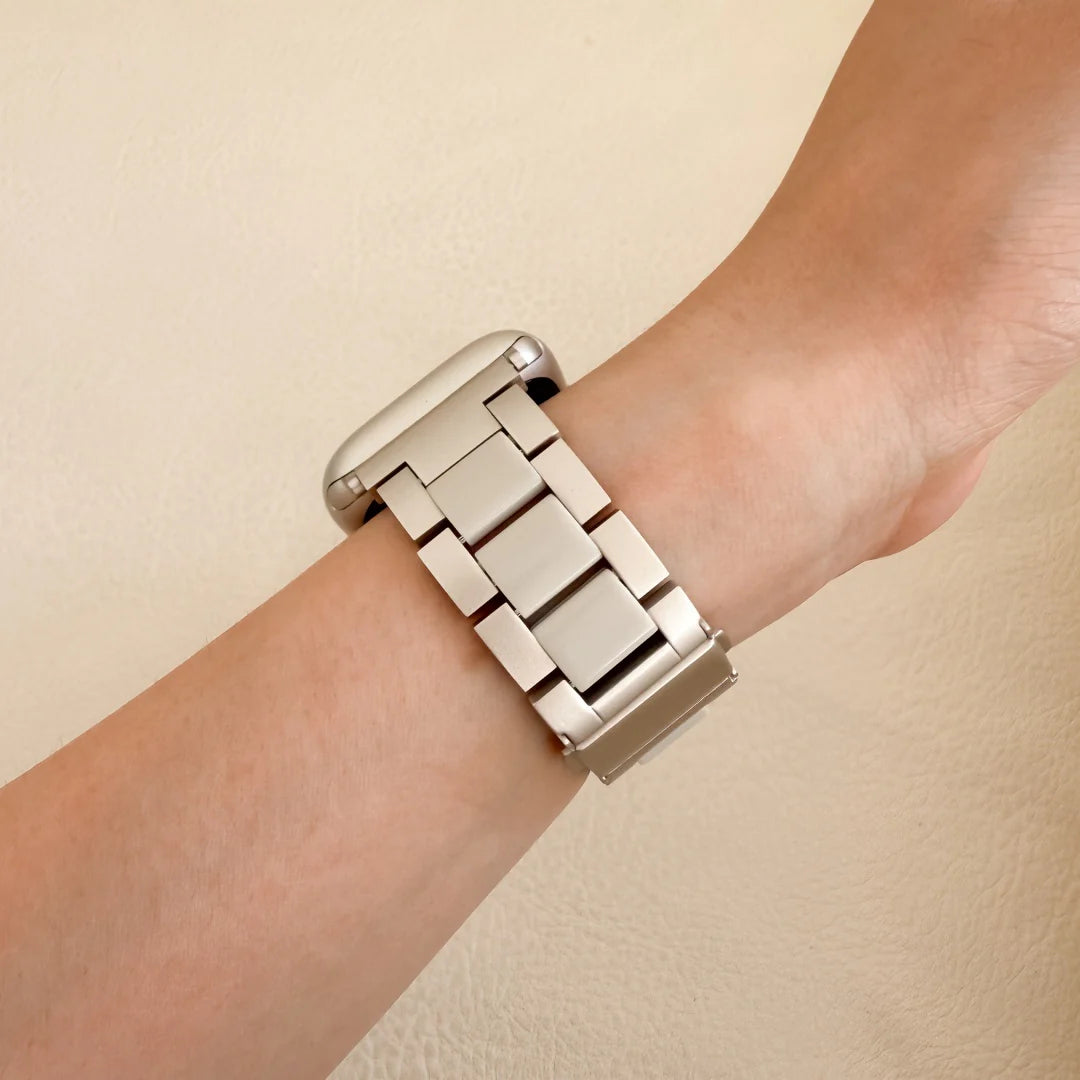 starlight apple watch watch band on a wrist