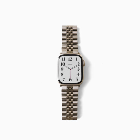 A silver stainless steel Jubilee watch band for Apple Watch, featuring a brushed texture with polished highlights.