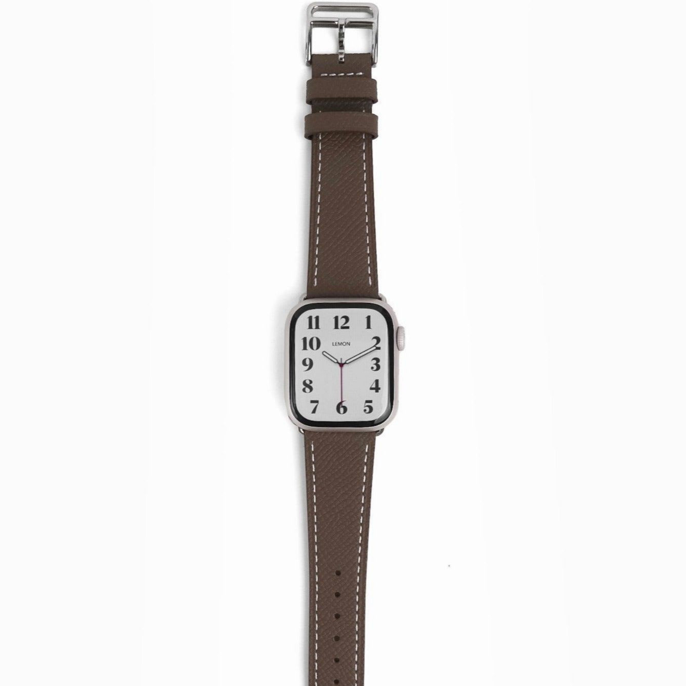 An olive brown textured leather Apple Watch band with a silver metal clasp and buckle, displayed on a white background.