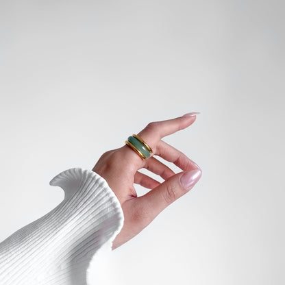 Matcha Ring Set on a pointing hand, side view of the green stone band and gold rings