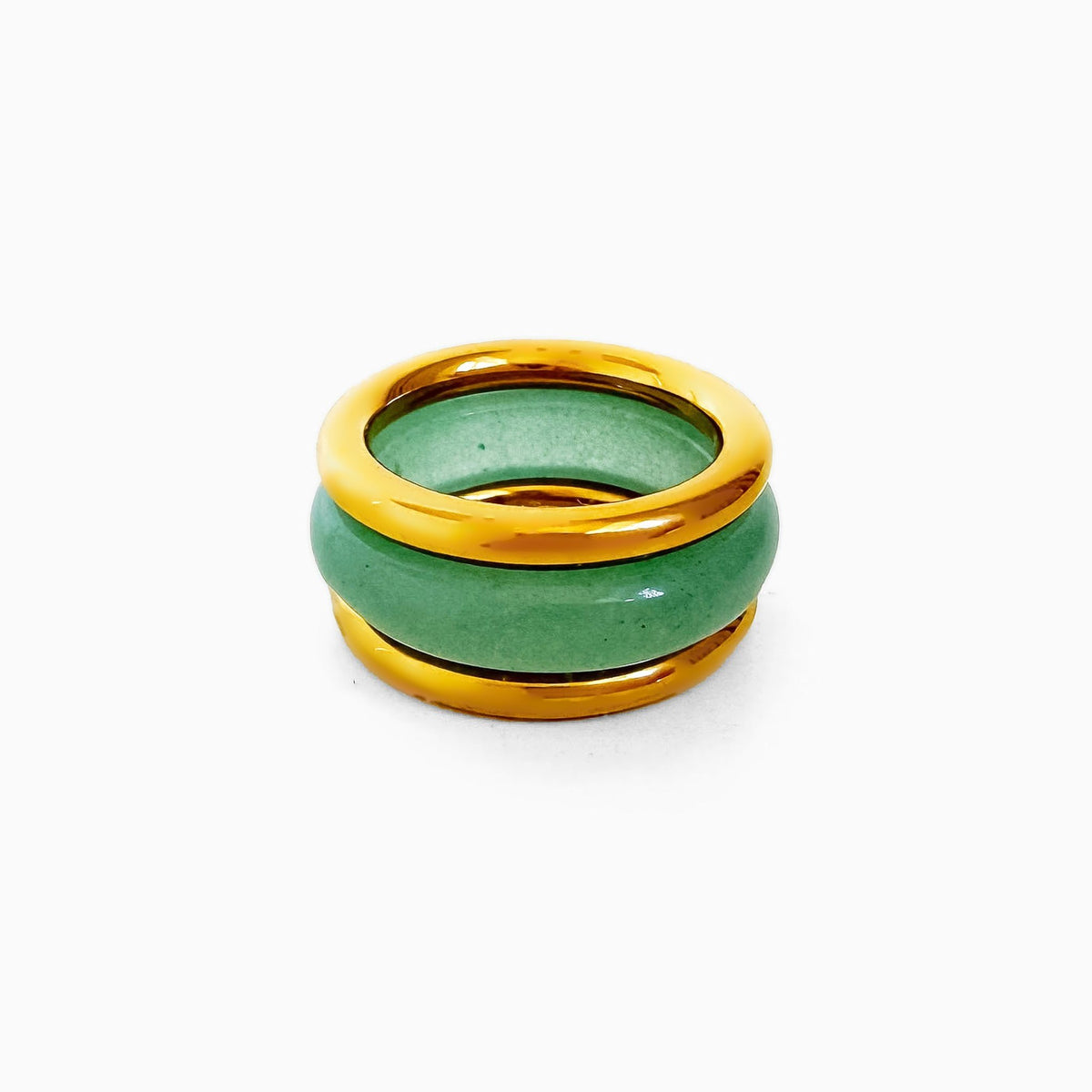 Matcha Ring Set, a pale green stone band stacked between two smooth gold-tone rings, on a white background