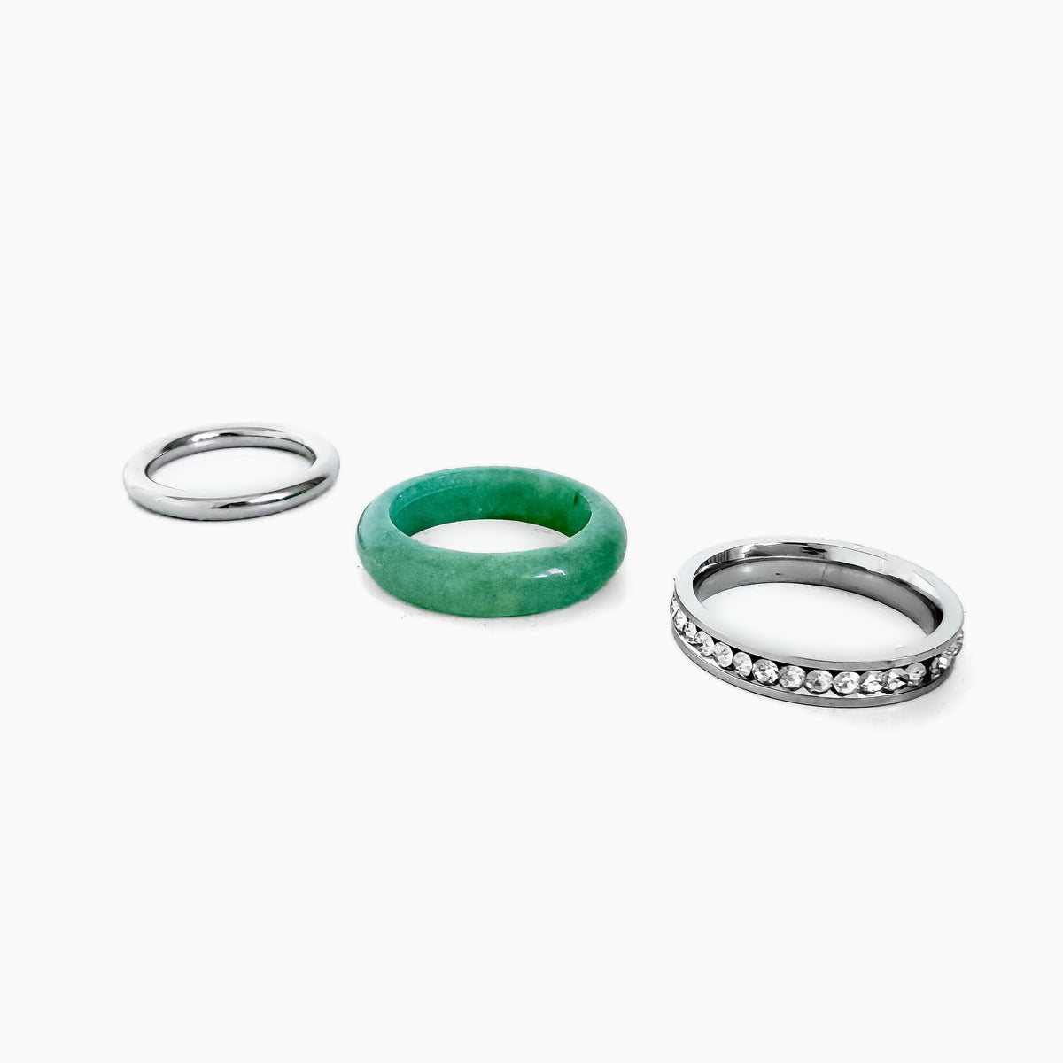 Mint Frost Ring Set laid out as three separate rings: smooth silver-tone ring, green aventurine band, and silver-tone rhinestone row band