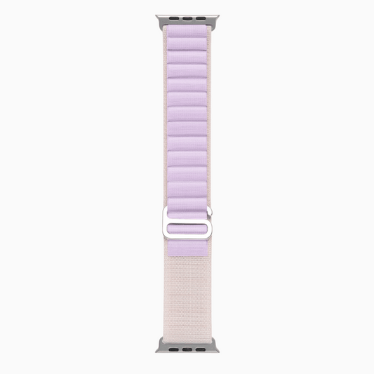 apple  watch bands, one lavender and one beige two tone, on a white background