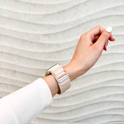 Mountain Nylon Apple Watch Band in starlight and pink worn on wrist, side view