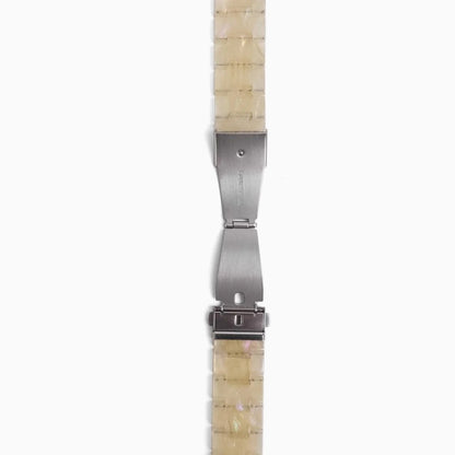 Polly Resin Apple Watch Band in starlight, open butterfly clasp on white