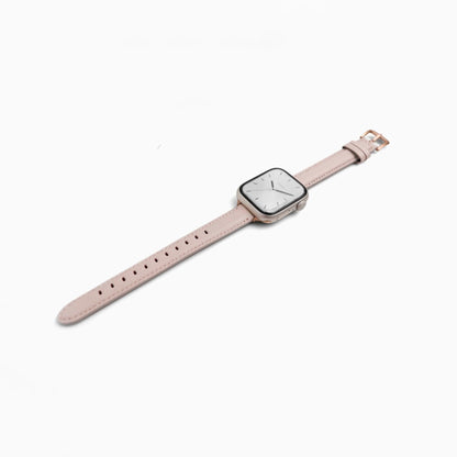Rosé Leather Apple Watch Band in pink, laid at an angle on white