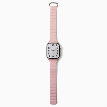Slim Snap Loop Apple Watch Band in pink with watch attached, front view on white