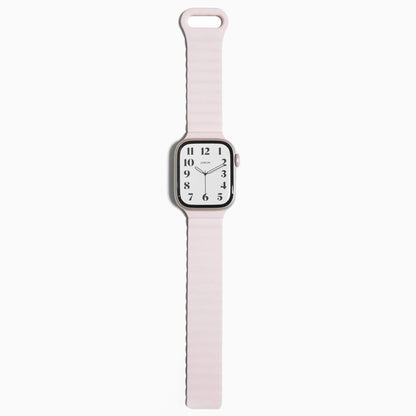 Magnetic Snap Silicone Apple Watch Band in light pink, full length on white with loop end