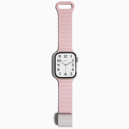 Magnetic Snap Silicone Apple Watch Band in pink and starlight, starlight magnetic tip, front view on white