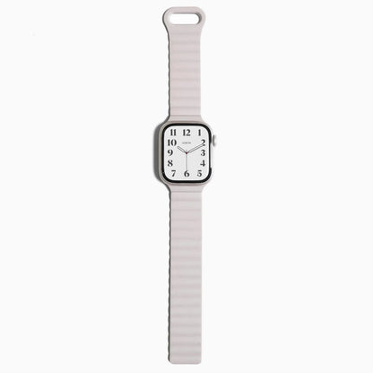 Magnetic Snap Silicone Apple Watch Band in starlight, full length on white with loop end