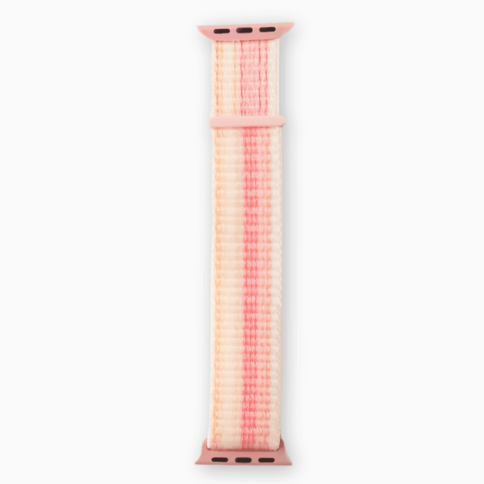 A pink nylon watch strap with a pattern, designed to be attached to a smartwatch.