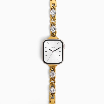 Blossom Apple Watch Band in gold stainless steel with crystal flowers, flat on white