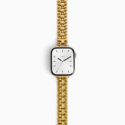 Flowerwall Apple Watch Band in 18k gold plated stainless steel, double-row links, flat on white