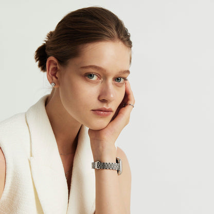 Woman wearing the Inspiration Apple Watch Band in silver, view 3