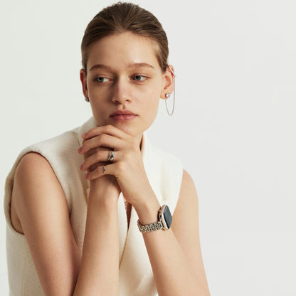 Woman wearing the Inspiration Apple Watch Band in silver, view 4
