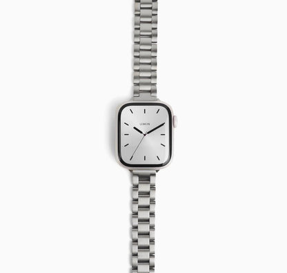 Slim Oyster Apple Watch Band in silver stainless steel, front view on white